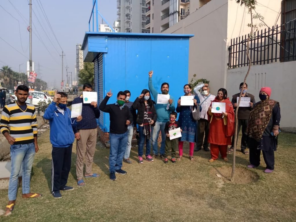 Protest by NEFOMA against illegal Milk Booth made by Gaur city builder in 14th avenue Green Belt area.